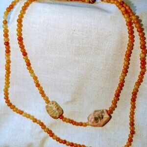 New monochromatic double strand necklace